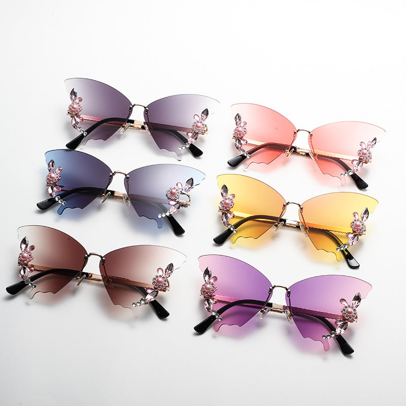 Gafas de sol de PC sin borde de diamante de forma de mariposa al por mayor